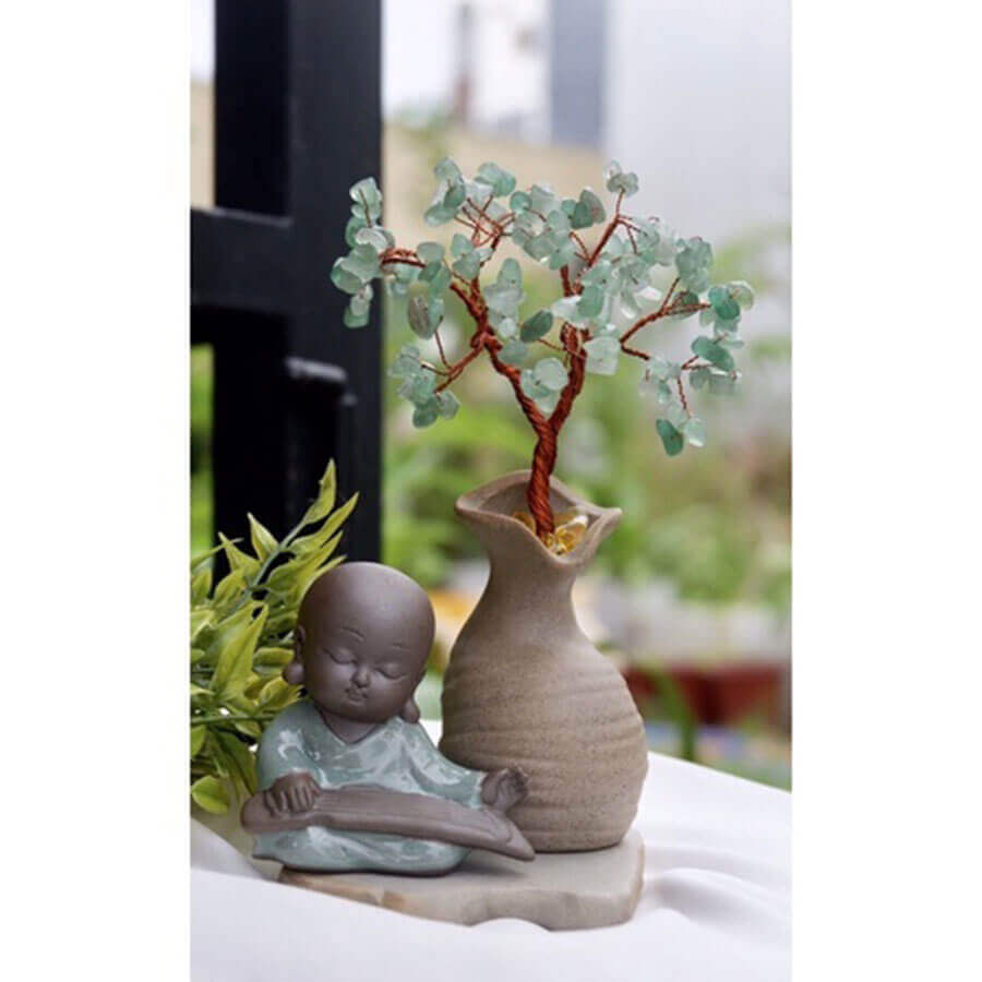 Tượng Chú Tiểu An Nhiên Gốm Men Xanh Kèm Cây Tài Lộc 2 Chú tiểu an nhiên hiện thân cho nét đáng yêu, vui vẻ, không vướng bụi trần